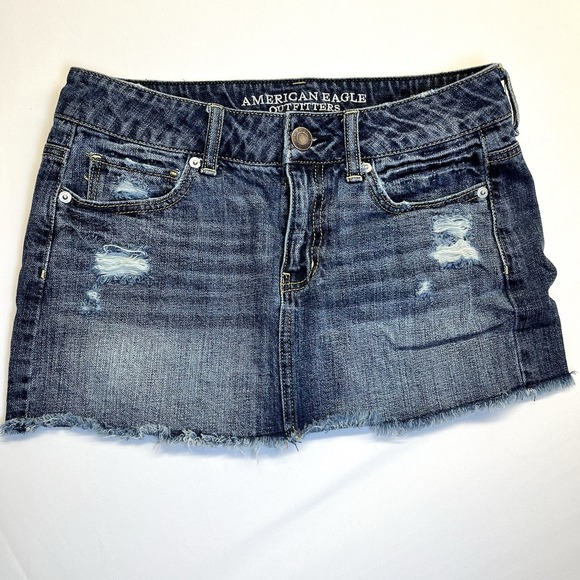 American Eagle Outfitters Dresses & Skirts - American Eagle Blue Denim Mini Skirt Size 4 Destressed Raw Hem Y2K Style EUC